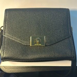 Michael Kors mini crossbody in black pebble with gold